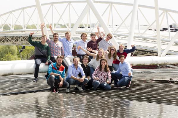 
The team standing on the roof of a football stadium, on which solar installation of 3400 panels had been installed. The design and calculations were made using our software!" 